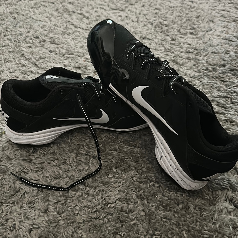 Never worn Nike softball cleats